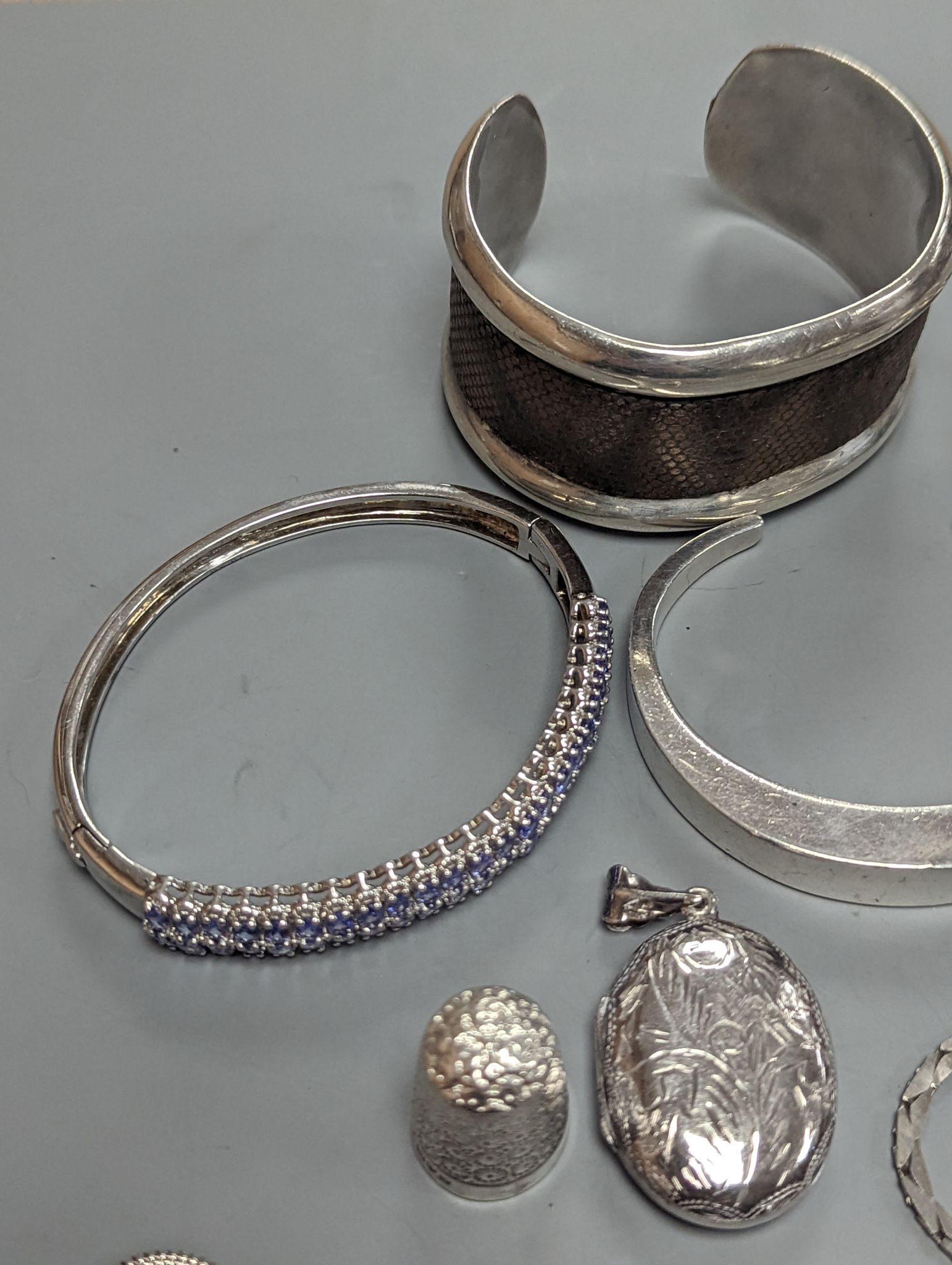 A quantity of assorted jewellery etc. including Danish sterling bangle and leaf brooch, a white meta and niello bracelet and a 925 and enamel flower brooch.